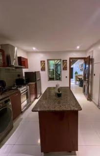 2bedroom apartment with 24hours power and Wi-Fi, elevator access, and a view of Coaster Road - 9