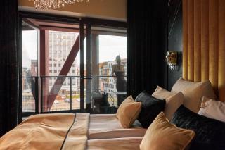 Granaria Riverside Suites by Downtown Apartments - 1