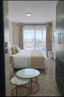 Elegant Cozy Haven with a Rooftop Pool - 1