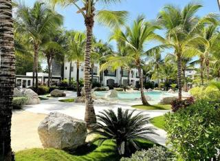 White haven surrounded by tropical gardens, pools - 1