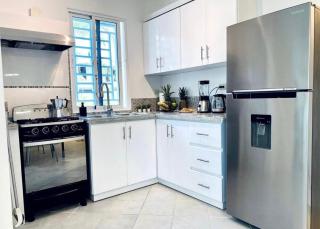 White haven surrounded by tropical gardens, pools - 1