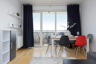 Modern Apartment with a Balcony and 2 Parking Spaces by Noclegi Renters - 1