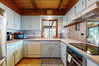 Unique lakefront cabin near the dunes with a private dock & fireplace - 4