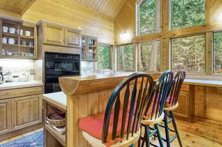 Riverfront home with deck fireplace & salt water hot tub- near hiking & lake - 5