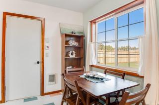 Downtown home with private hot tub & WiFi - walk to beach - dog-friendly yard - 6