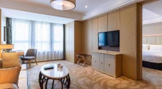 Sky World Hotel Qingdao - 8