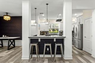 Modern Spacious Getaway: Heated Pool, Movie Room, Huge Yard & Event-Friendly in New Port Richey, Florida - 2