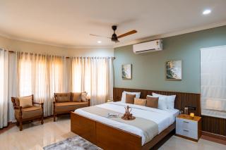 ELIVAAS Valiyaveetil Mansion 5-BHK Mansion With Private Pool, Home Theatre, Garden & Lift Near New Marine Drive - 8