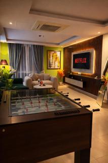 Luxury 2 Bedroom Sky Suite at Gold Crest Lahore with City Views, Xbox & Foosball - 9