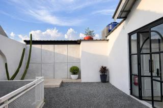 RedDoorz at Mouza Guest House Antapani Arcamanik Bandung - 1