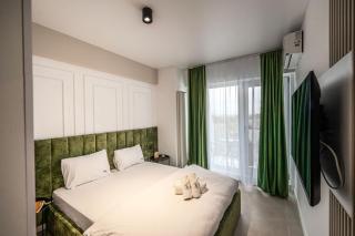 Bloomy Apartment in Odyssey Pools SPA and Parking Resort - 1