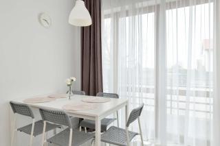 Bright Air-Conditioned Apartments with Parking and Terrace or Balcony by Noclegi Renters - 2