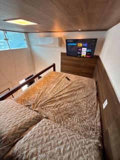 04 Mini casa pra 4 pessoas com ar perto da praia com garagem - 1