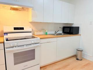 Private 2-Bedroom Basement Suite with Patio, Free Parking & Laundry - 1