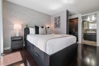 Bright & Modern 2BR Oasis w Balcony & Parking - 9