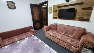 Cozy Furnished Family Apartment شقة عائلية مفروشة - 9