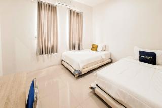 Urbanview Hotel Gracia Metro Lampung - 7