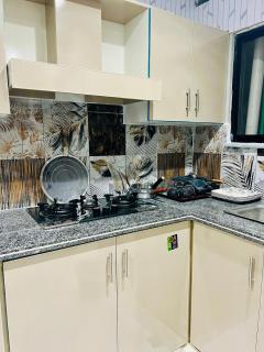 One Bedroom Luxury and Elegant Silver Themed Apartment by Iqbal Heights at Bahria town Phase 8 Rawalpindi - 2