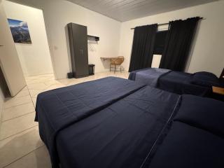 Quartos com AR no centro - Garagem - check in 24h - 8