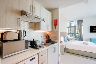 Cozy Studio in Palm, Steps to Beach & Mall - 1