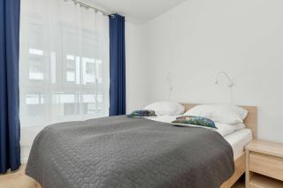 Quiet Apartment with Parking Near the City Center by Noclegi Renters - 9