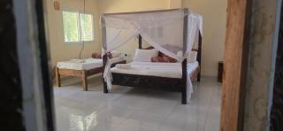 Luxurious 4-Bedroom Holiday House with Pool Access in Diani Beach - 8