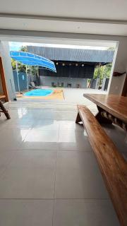 Large barbecue area with a swimming pool and a spacious room - 7