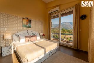 StayVista's Hillside Meadows - Mountainside Retreat with Farm View, Pool & Deck, Lawn & Gazebo - 7