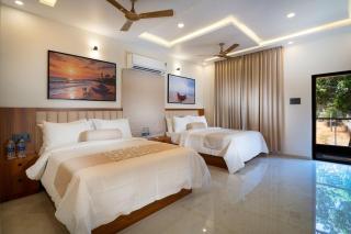 Saranvi Resorts 2BR Near Beach by Homeyhuts - 8