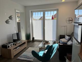 Inselparadies - Neubauwohnung mit großer Terrasse, Strandkorb und Garten. - 4