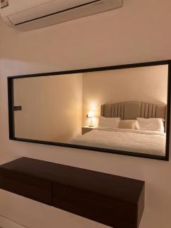 Modern room and lounge close to Al Hamra Mall and the metro - 1