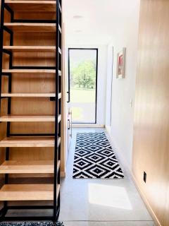Modern Loft Cabin with Skylights, Paddle Boards & Trail Access in Humboldt, Kansas - 5