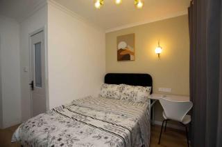 胡志明市第七郡28间房温馨民宿近市中心出行便利 Cozy Homestay with 28 Rooms in District 7 Close to City Center Nhà Nghỉ Dưỡng 28 Phòng Quận 7 Gần Trung Tâm Thành Phố - 1