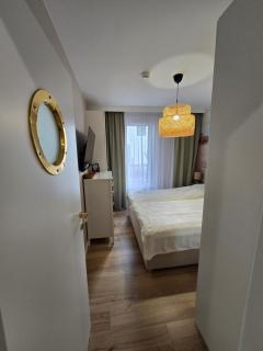 Apartament w lesie nad morzem i jeziorem Porto Łeba z ogródkiem - 8