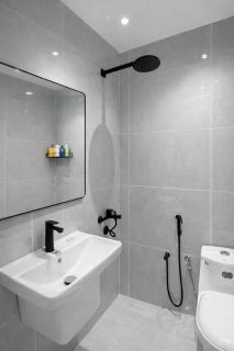 A luxurious apartment in Al-Wadi neighborhood with a private outdoor seating area - 1