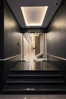 A luxurious apartment in Al-Wadi neighborhood with a private outdoor seating area - 4