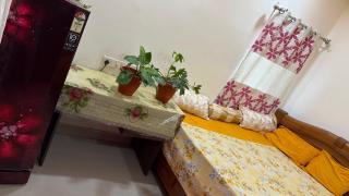 Eastern Bedroom with separate refrigerator - 2