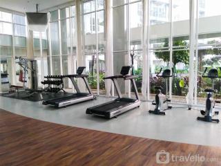 Fancy and Nice Studio Room at Casa De Parco Apartment By Travelio - 5