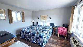 Motel et Chalets l'Acadien sur mer - 1