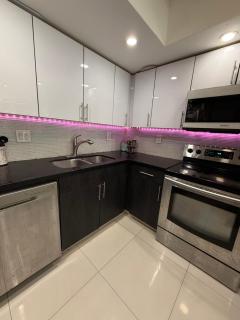 Modern 2BR beachfront with pool & tennis view - 7