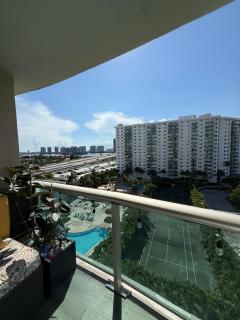 Modern 2BR beachfront with pool & tennis view - 9
