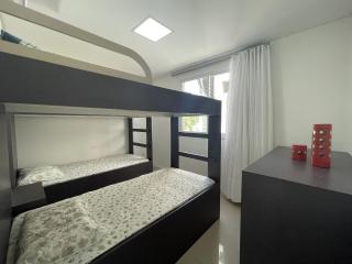 Residencial Renata - Apartamento completo na Praia de Palmas, a 315 metros do mar, com 3 dormitórios e acomodação para até 8 pessoas. - 2