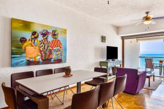 Beachfront 4th-floor condo with views, outdoor pool, balcony, W/D & central AC - 1