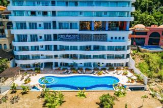 Oceanfront condo with rooftop infinity pool, panoramic views, balcony, gym, & AC - 7