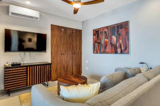 Modern waterfront condo with shared pool, balcony, and washer/dryer - 6