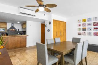 Chic coastal condo with private balcony, pool access & steps to the beach - 1