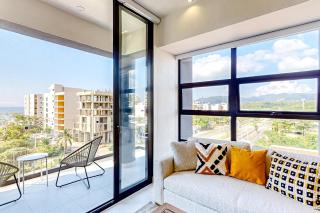 Ocean-view condo with infinity pool, rooftop lounge, & private balcony - 2