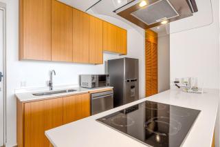 Oceanfront condo with a full kitchen, pool, & beach access - 2