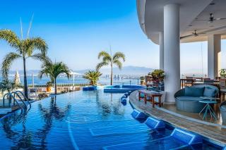 Modern hillside suite with balcony, city view, pools, gym & full kitchen - 3