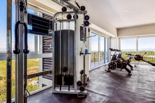 Ocean-view condo in Puerto Vallarta with rooftop pool, fitness room, and balcony - 4